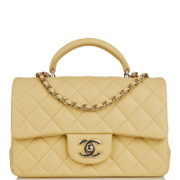Стеганая мини-сумка Chanel с ручкой