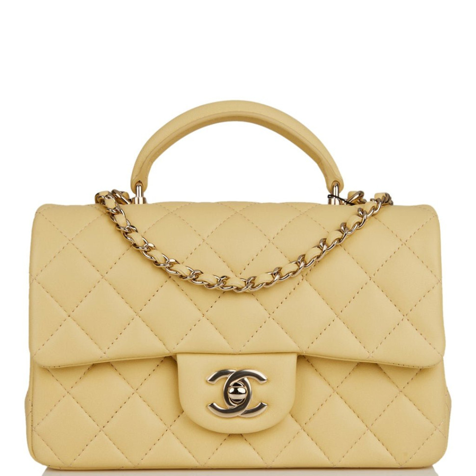 Стеганая мини-сумка Chanel с ручкой