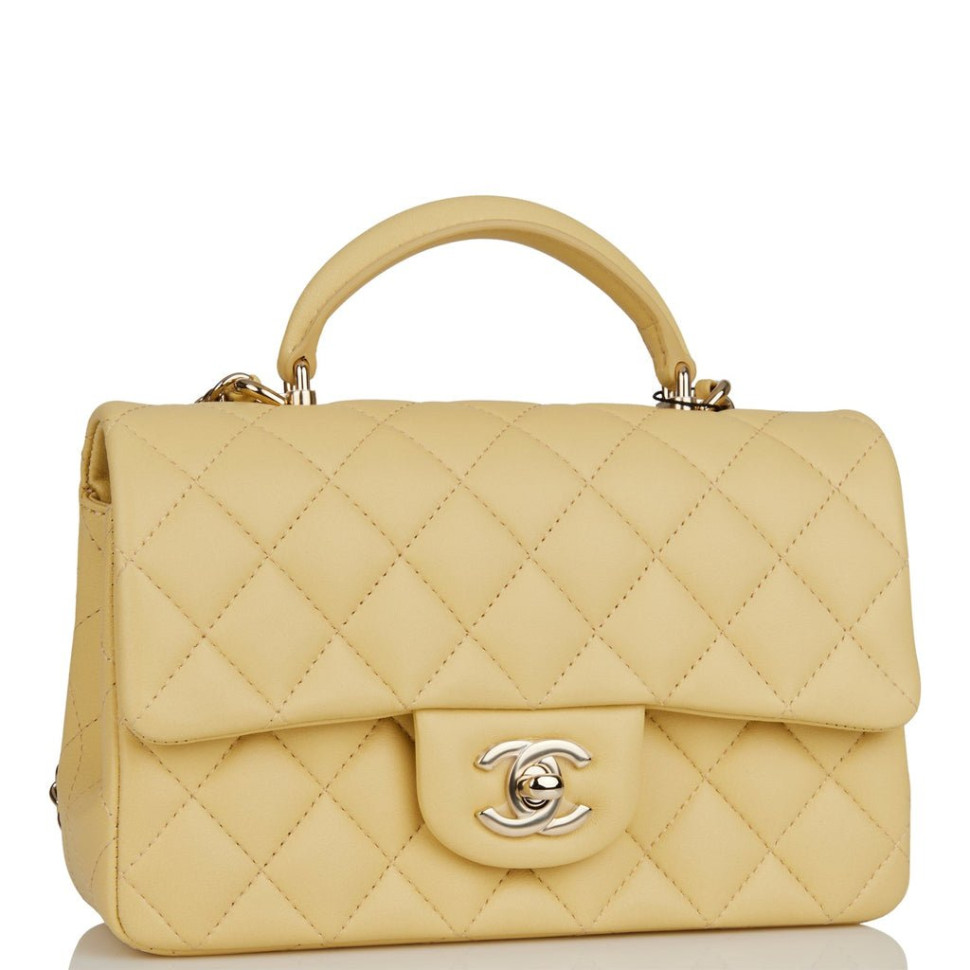 Стеганая мини-сумка Chanel с ручкой