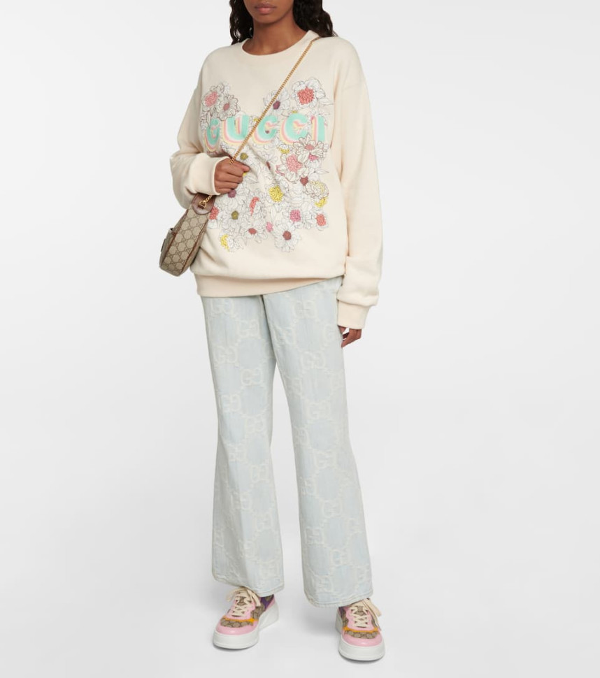 Gucci Женские кроссовки с тиснением GG